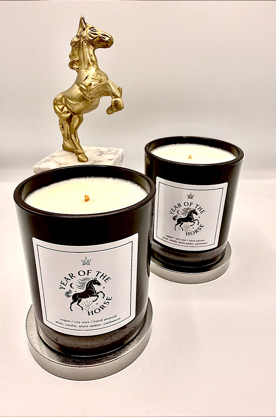 Candle labeled 'Year of the Horse' being lit with 'UNTAMED.' text above